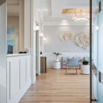 Reception desk and welcoming lobby area inside the Arsenault Dermatology North Lakewood Ranch office.