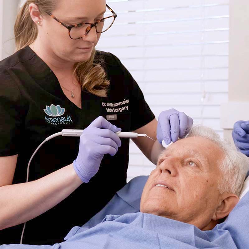 Dermatologist providing Mohs surgery care at Arsenault Dermatology Lakewood Ranch SR 70